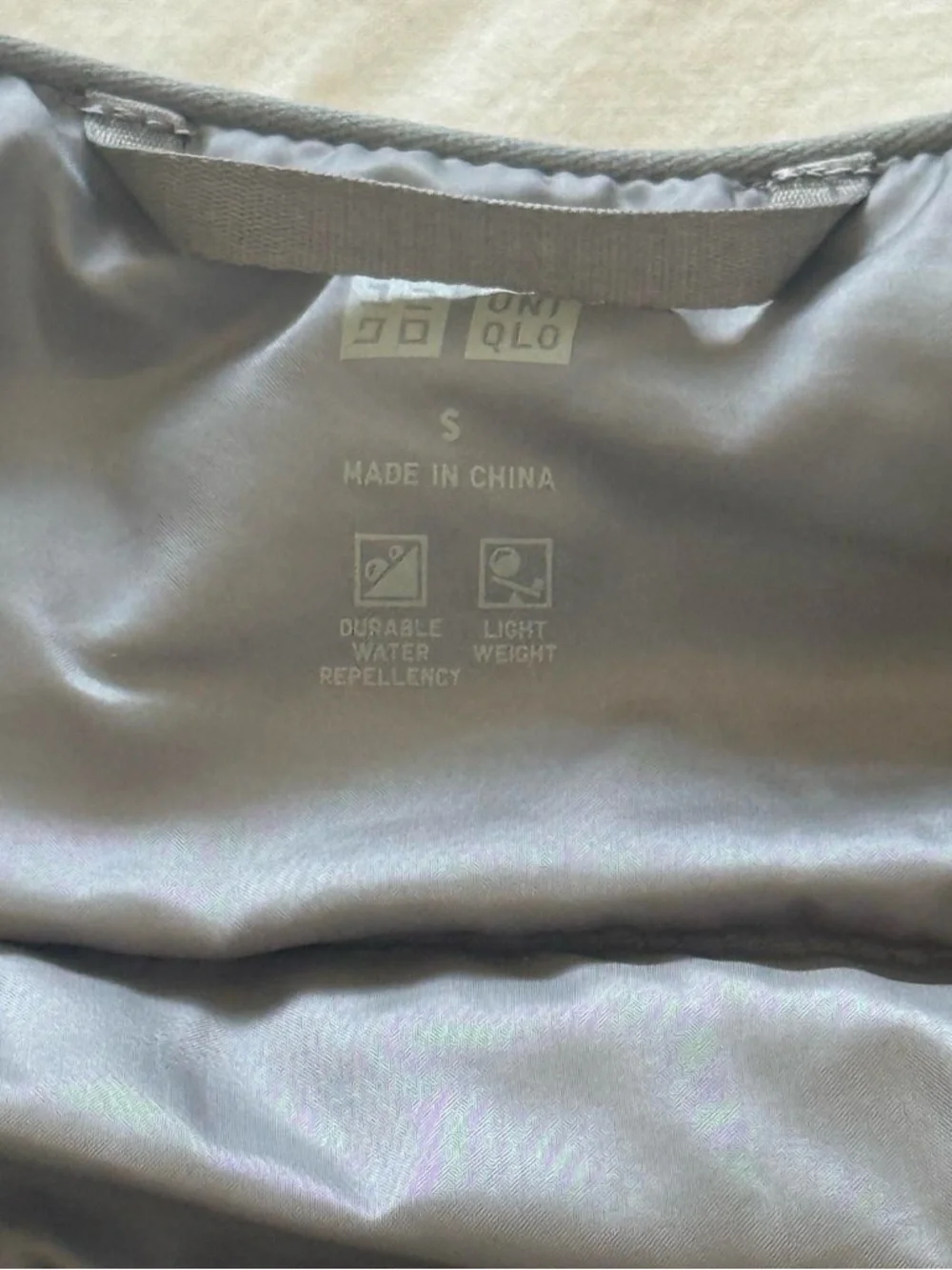 Uniqlo Ultra Light Silver Grey Down Puffer Vest - Picture 3 of 5